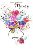 This Mother's Day card features a lively, watercolour bouquet that looks as though it has been painted in one flowing, expressive breath. The central arrangement brings together generous blooms in vibrant cerise, fuchsia, and cherry pink, their rounded forms softening into clouds of indigo, cobalt, and bluish-violet at the edges. Patches of softer tones-pale peach, blush, and a hint of lemon-glow through the cooler shades, lending the image warmth similar to the late afternoon light over Kennington Park. Rather than crisp outlines, the flowers are defined by overlapping pools of pigment that blur and blend, creating the impression of a hand-tied bouquet seen slightly out of focus, all colour and feeling. Fine threads of metallic gold skim around a selection of petals and curve between leaves, adding delicate sparkle reminiscent of a special gift. At the bottom of the composition, a gently rounded vase gathers the stems, painted in translucent washes and finished with a small, elegant gold bow that recalls the touch of ribbon a florist in Kennington might tie before sending flowers out for delivery. Around the bouquet, tiny hearts and splatters of matching colour keep the white background lively, suggesting confetti or petals tossed in celebration. The overall effect is tender yet exuberant, a visual echo of someone standing at a doorstep near the Oval, holding out a bouquet and saying, without needing many words, Happy Mother's Day, with all my love.